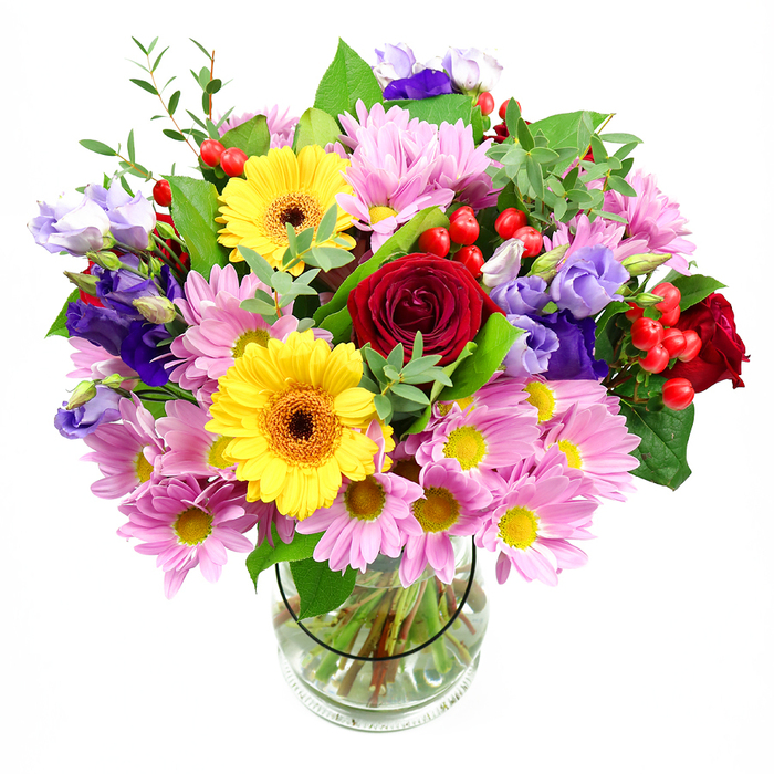 Designed for the home and heart of Emerson Park, this lush arrangement sits in a clear glass vase, its blooms arranged with the confidence of a seasoned Romford florist. Deep red roses anchor the display, their velvety petals framing two bold yellow gerbera daisies with dark centers that draw the eye. Surrounding them, soft pink daisies or chrysanthemums build gentle volume, while purple and lavender lisianthus add a touch of cool sophistication. Interspersed are crisp Hypericum berries in bright red, like tiny confetti among the petals. The foliage-broad, dark leaves and slender light-green sprigs-gives the bouquet depth and natural movement, grounding the vivid colors in fresh greenery. The vase, filled with clear water, offers a transparent stage for the stems and a glimpse of precise trimming. This design suits celebrations, thank-you moments, or a thoughtful gift delivered to homes around Emerson Park, including nearby streets and the rail connections from Emerson Park Station. For customers in Havering and beyond, the bouquet is available for same-day delivery, wrapped in the confidence that comes from a local florist who knows the neighbourhood's rhythms and preferences. The result is an arrangement that feels handcrafted, mindful, and ready to brighten a room with lasting beauty.